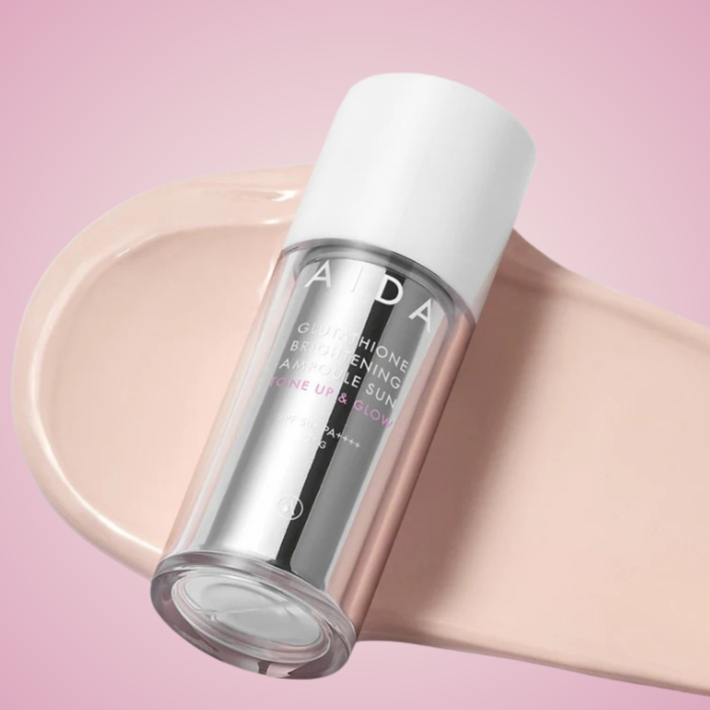 AIDA Glutathione Brightening Ampoule Sun SPF50+ PA++++ bottle resting on smooth cream texture