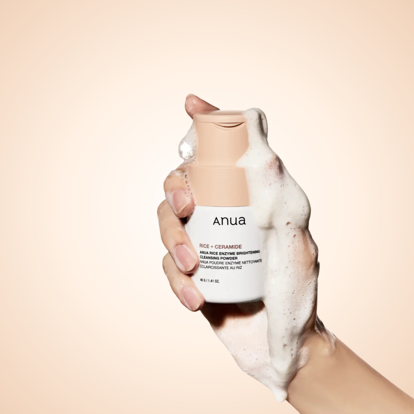 Anua Rice Enzyme Brightening Cleansing Powder 40g in hand with foam – brightening cleanser for radiant, refreshed skin.