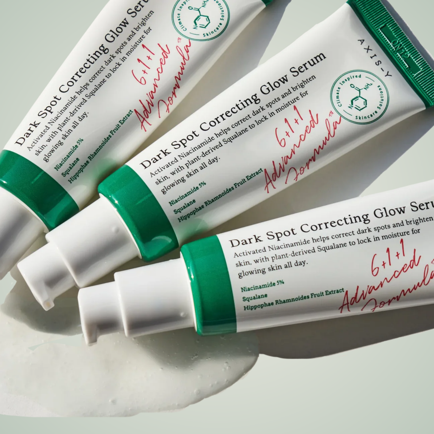 AXIS-Y Dark Spot Correcting Glow Serum flatlay – hydrating serum with niacinamide and squalane.