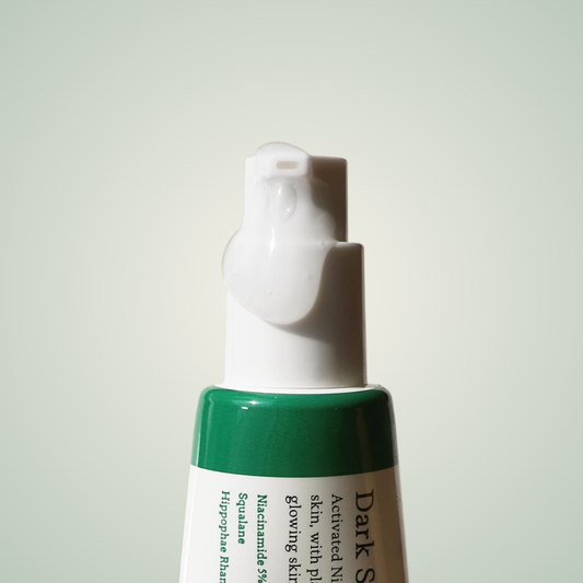 AXIS-Y Glow Serum pump detail – lightweight serum for dark spots and dull skin.