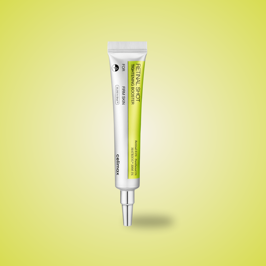 Celimax Vita-A Retinal Shot Tightening Booster standing tube on yellow background – anti-aging retinal skincare treatment.