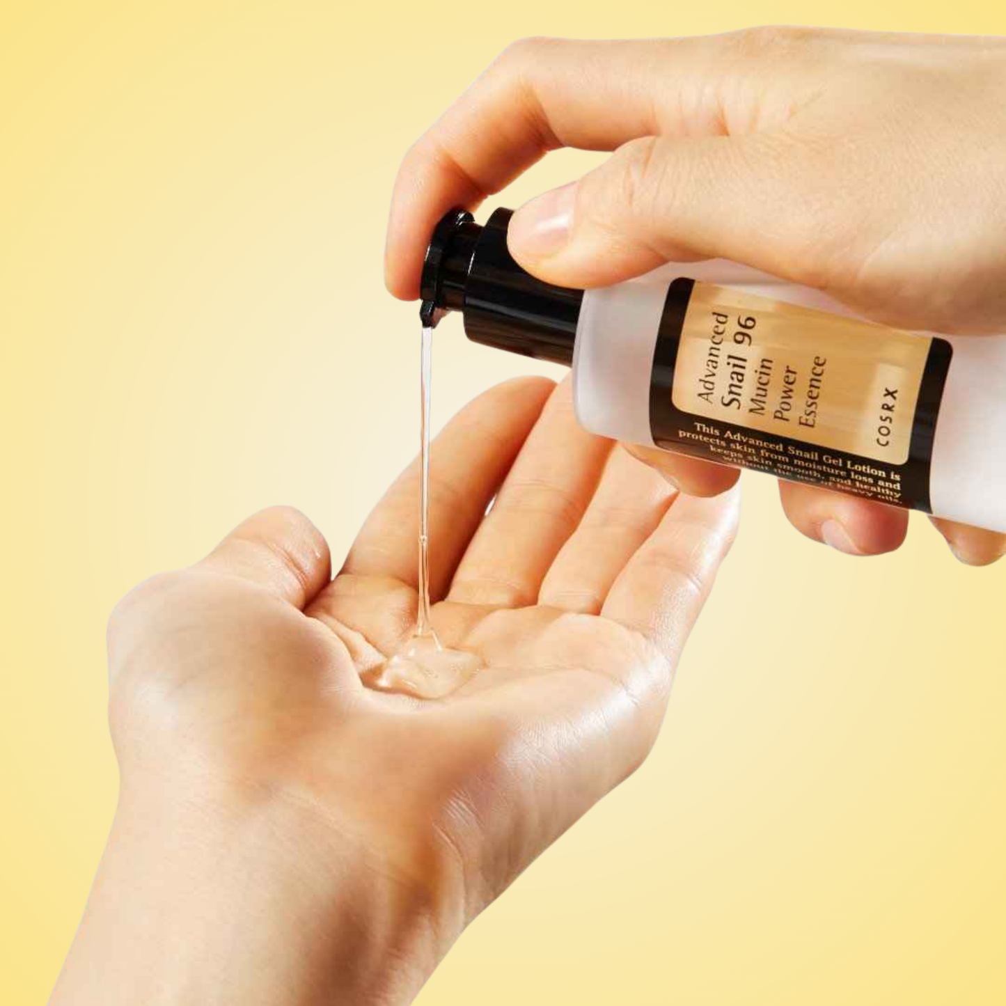COSRX Snail 96 Mucin Power Essence poured into palm – deeply hydrating essence for skin repair.
