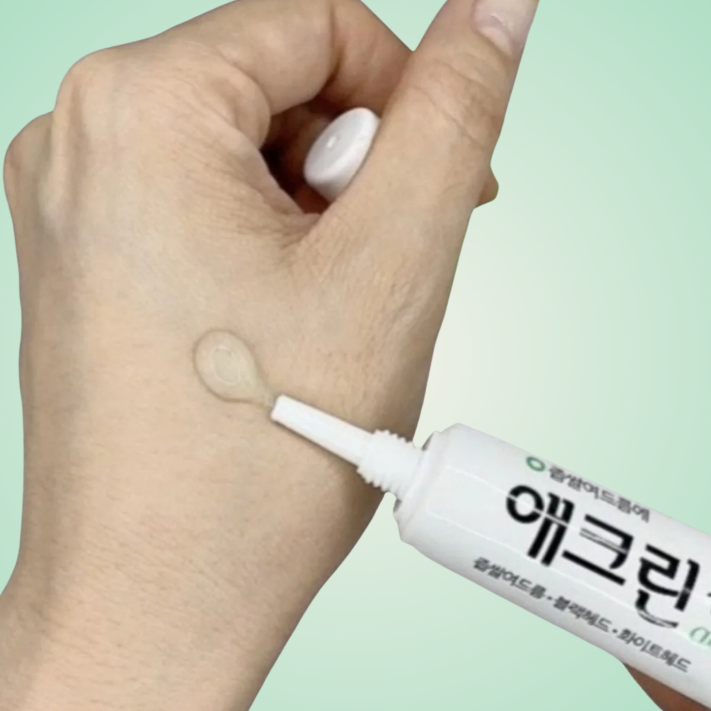Applying Aclean Gel on hand – calming and purifying spot treatment for acne-prone skin