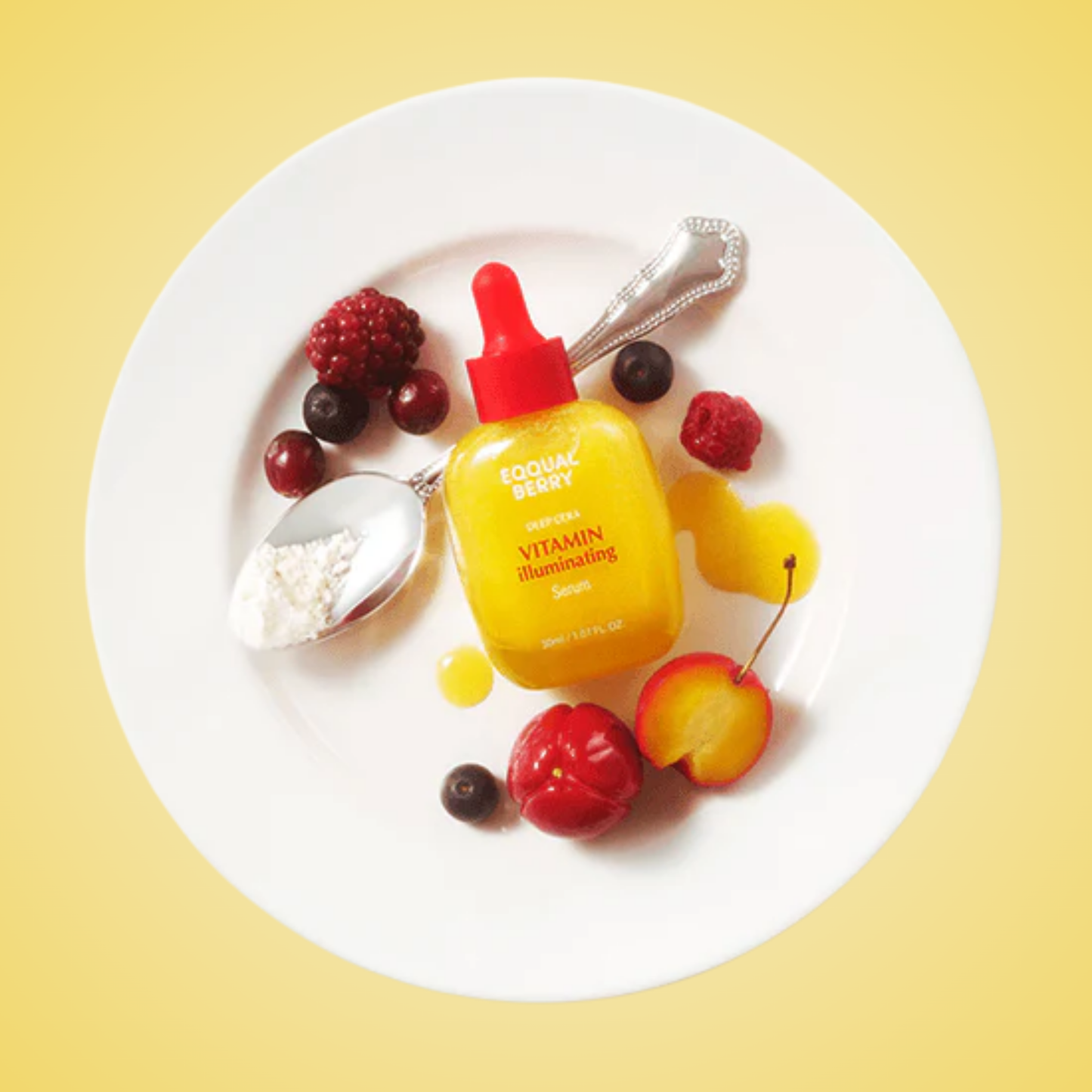 EQQUALBERRY Vitamin Illuminating Serum with berries and fruit flatlay