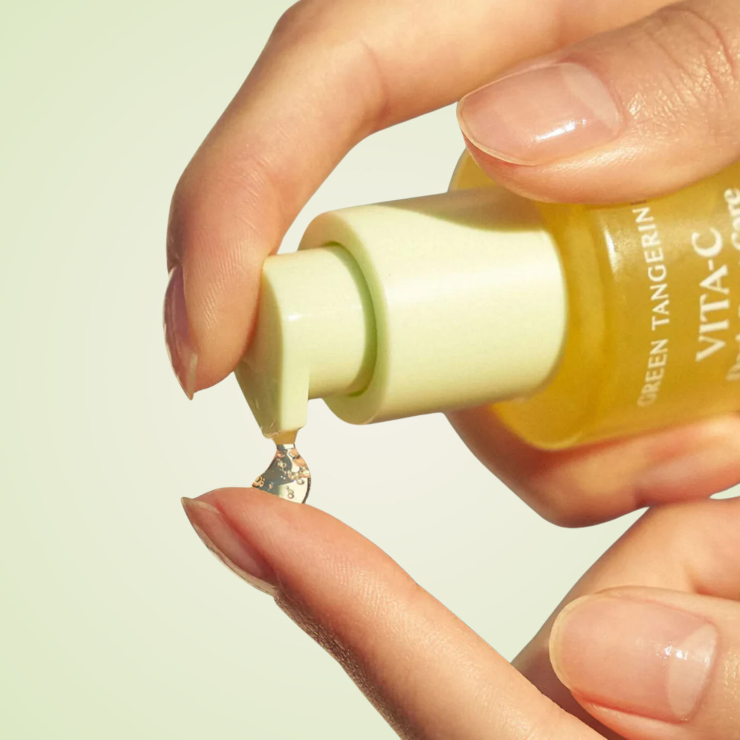 Applying Goodal Green Tangerine Vita C Serum – fresh vitamin C boost for clear, luminous skin
