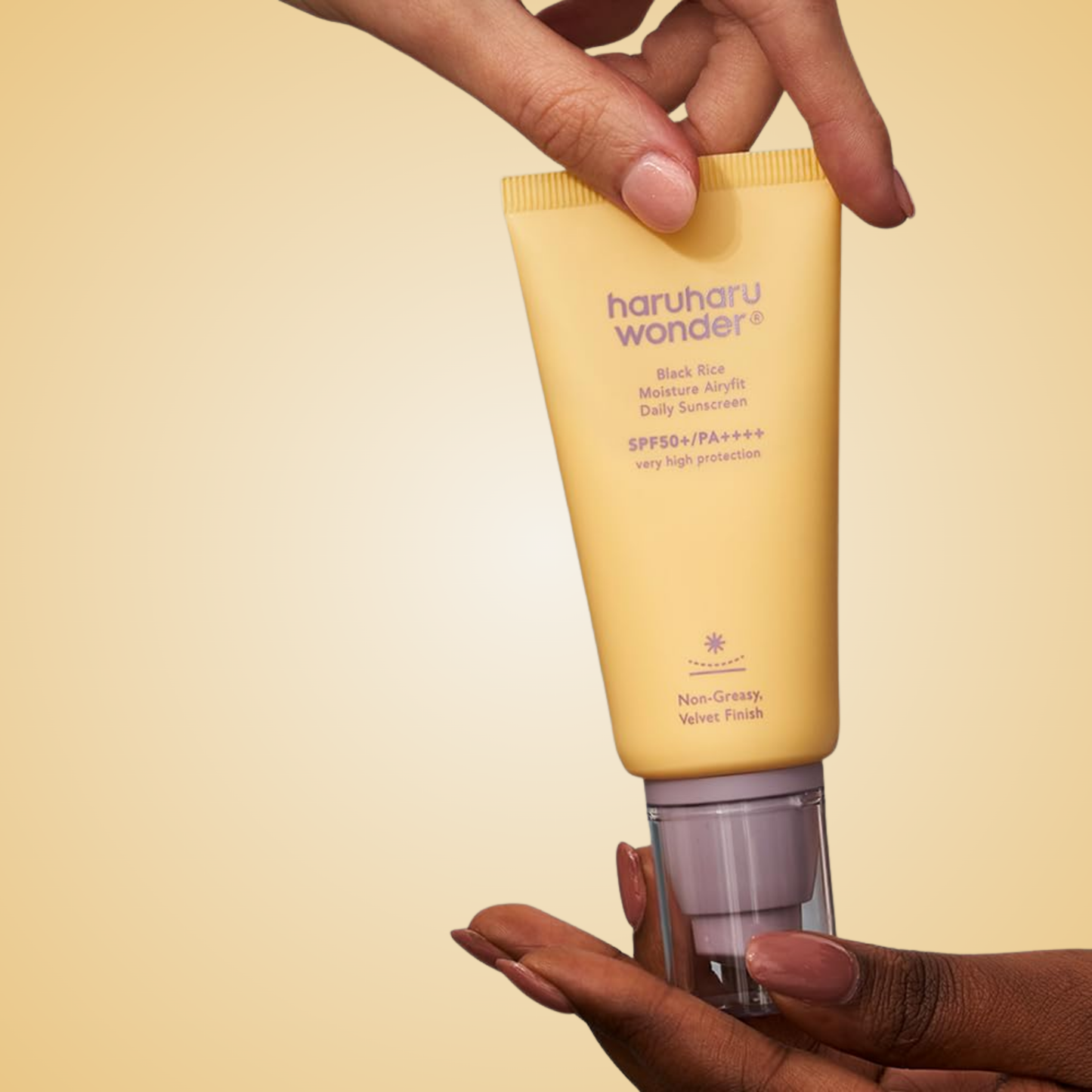 Applying haruharu wonder Black Rice Moisture Airyfit Daily Sunscreen – smooth lightweight protection that leaves skin soft and luminous