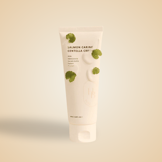 HEVEBLUE Salmon Caring Centella Cream tube with centella leaves – calming daily moisturizer for sensitive skin.