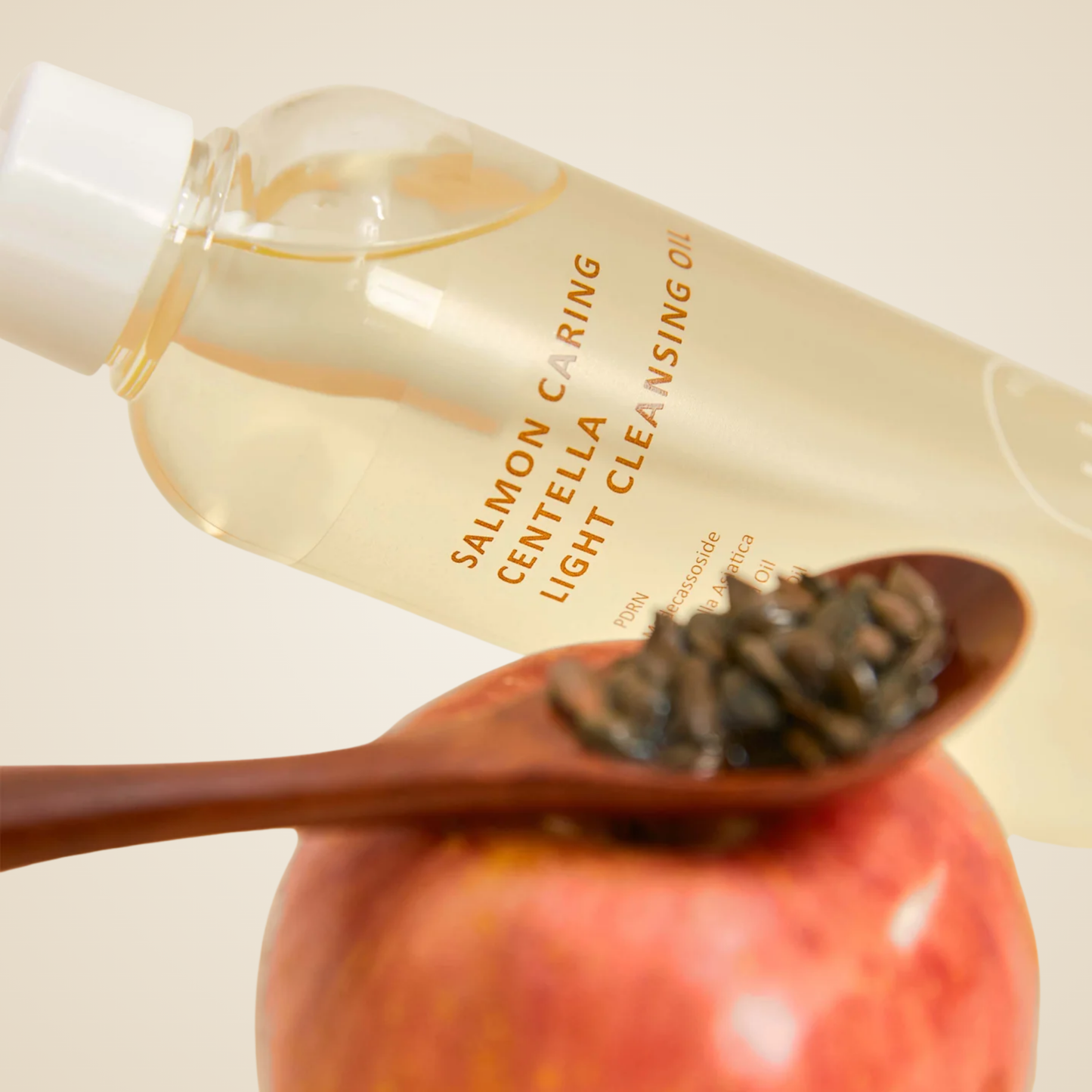 Heveblue Salmon Caring Centella Light Cleansing Oil styled with pomegranate – soothing oil cleanser for radiant skin.