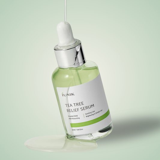 iUNIK Tea Tree Relief Serum with dropper dispensing clear texture