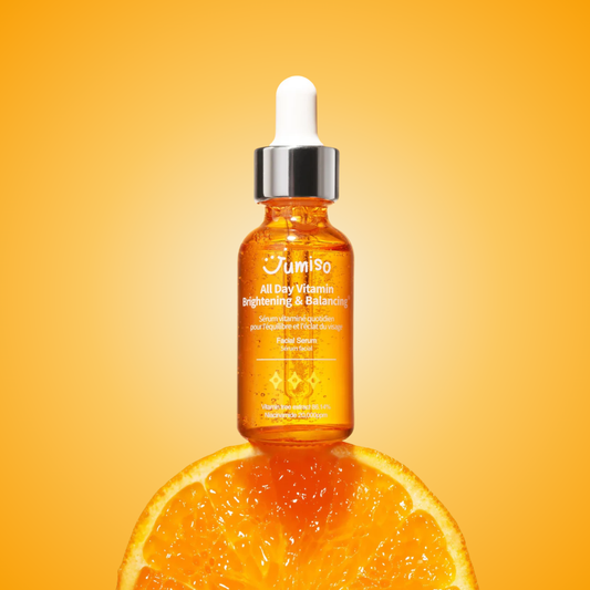 Jumiso All Day Vitamin Brightening & Balancing Serum styled with orange – antioxidant-rich serum for glow and hydration.