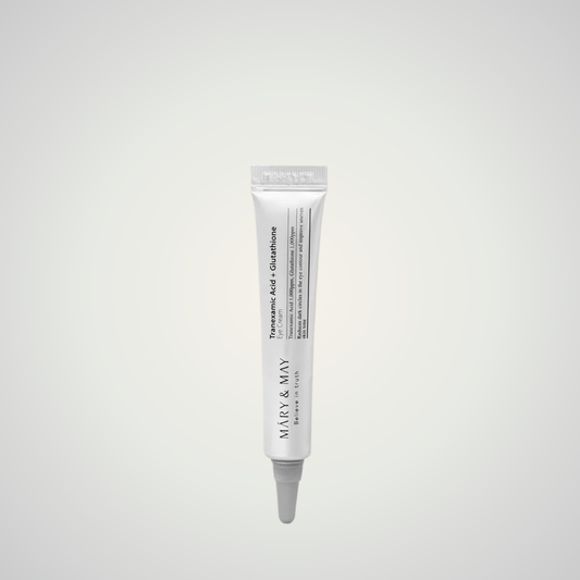 Mary & May Tranexamic Acid + Glutathione Eye Cream tube on beige background – brightening under-eye treatment