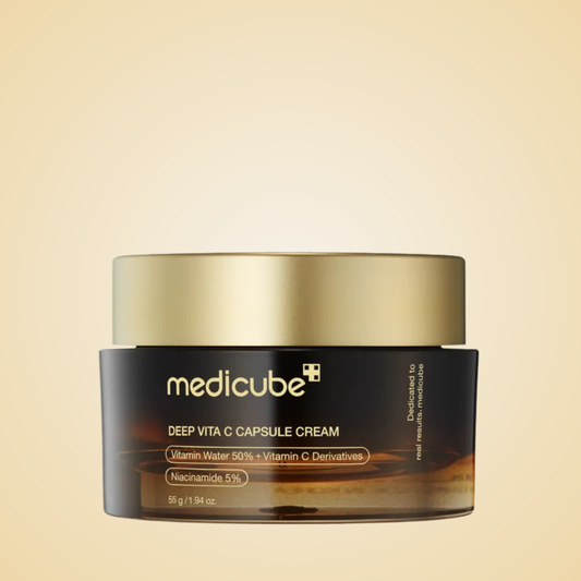 medicube Deep Vita C Capsule Cream 55g in brown jar with gold lid for brightening care.