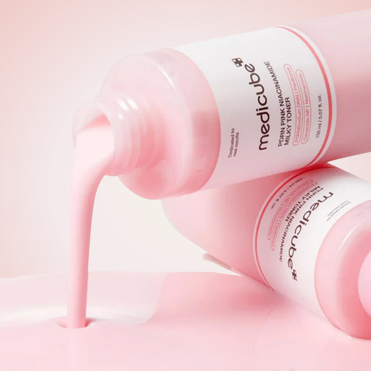 Creamy pink texture of Medicube PDRN Pink Niacinamide Milky Toner showing rich, moisturizing formula