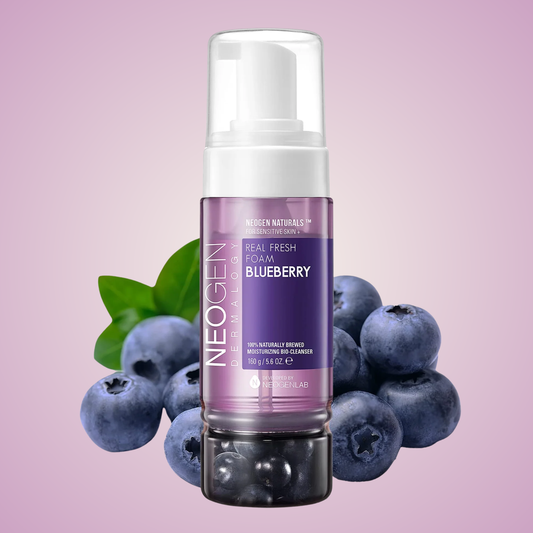 NEOGEN Real Fresh Foam Blueberry bottle flatlay with fresh blueberries on lavender background