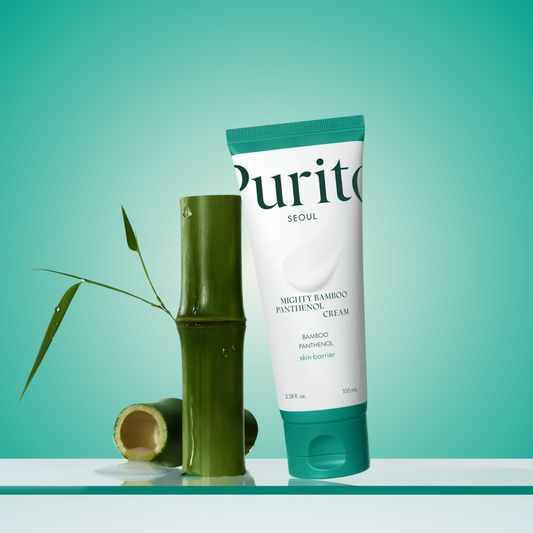 Purito bamboo cream beside bamboo stalks – refreshing moisturizer that strengthens the skin barrier
