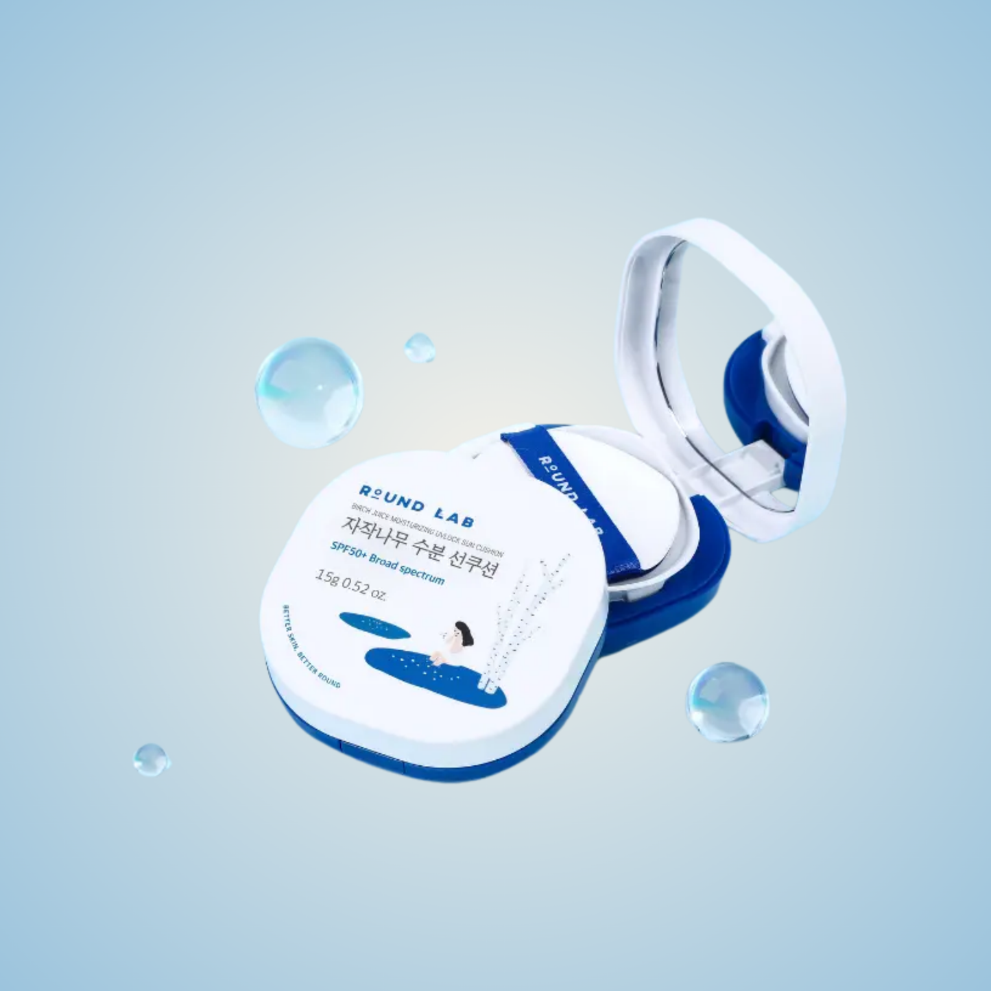 Flatlay of Round Lab Birch Juice Moisturizing UV Lock Sun Cushion with water droplets – cooling sun protection