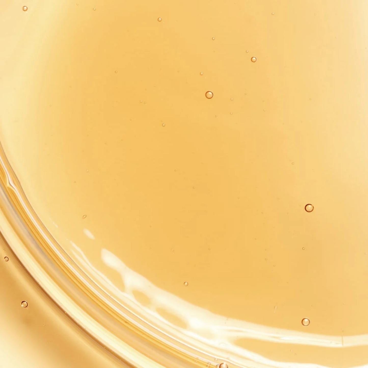 Close-up of Sulwhasoo First Care Activating Serum VI texture – golden lightweight serum for firm, luminous skin