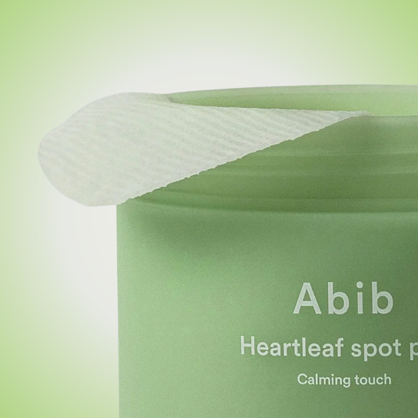 Close-up of Abib Heartleaf Spot Pad texture – soft cotton pads infused with calming essence