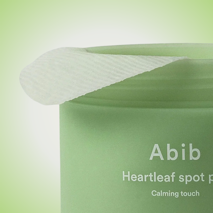 Close-up of Abib Heartleaf Spot Pad texture – soft cotton pads infused with calming essence