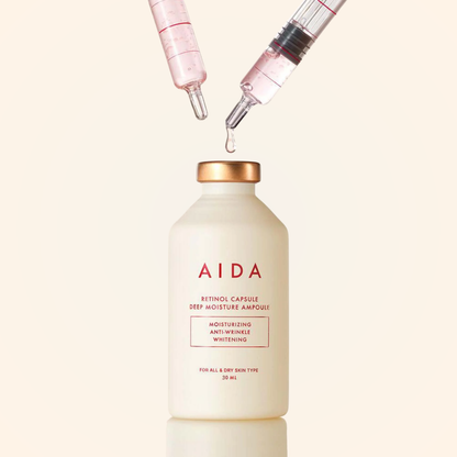 AIDA Retinol Capsule Deep Moisture Ampoule shown with dual syringes – advanced retinol hydration treatment