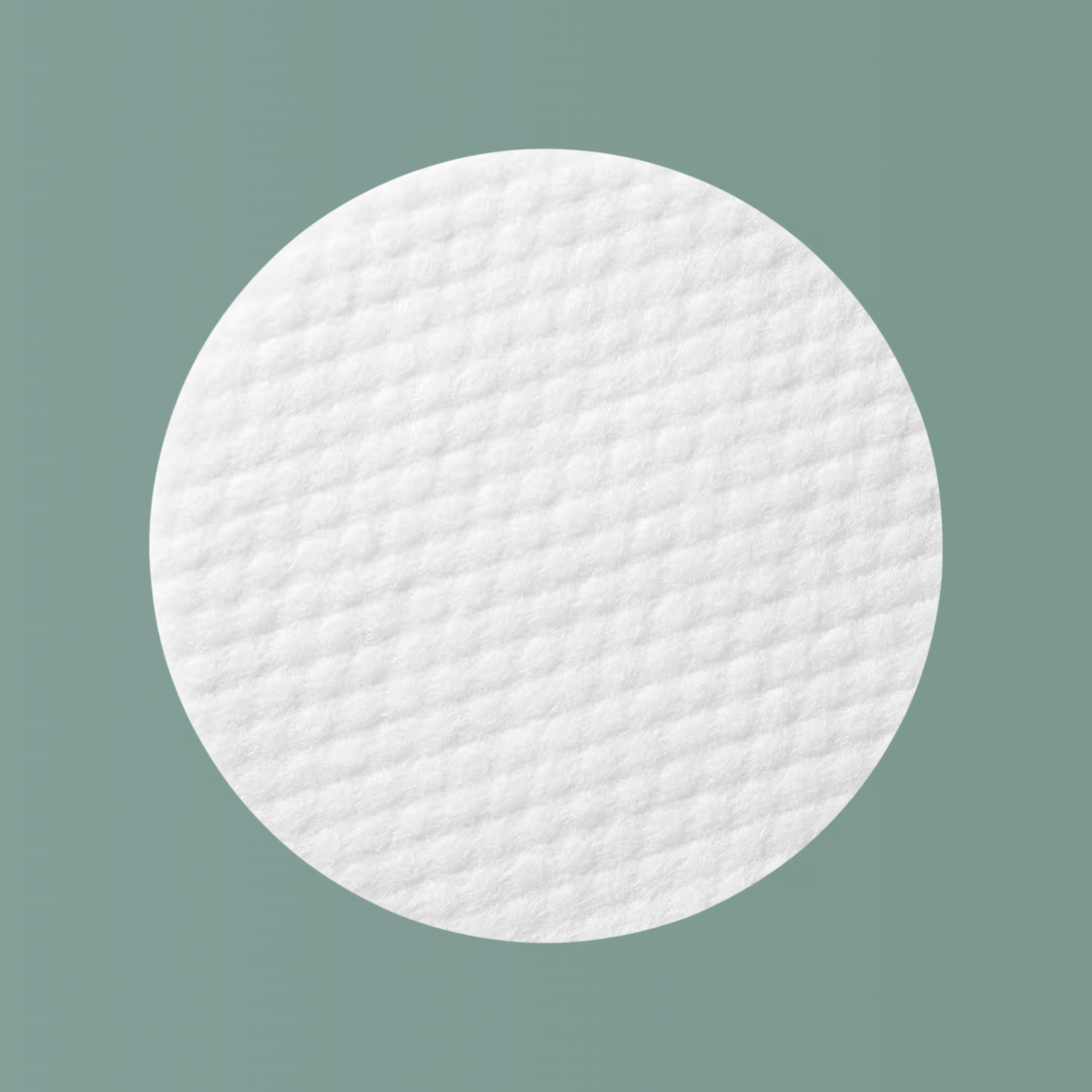 Close-up texture of Anua Heartleaf 77 Clear Pad – soft cotton pads infused with hydrating toner.