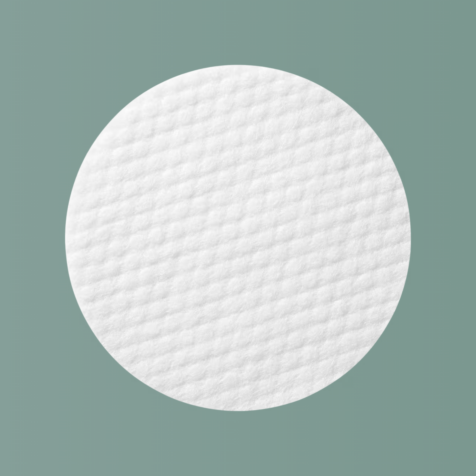 Close-up texture of Anua Heartleaf 77 Clear Pad – soft cotton pads infused with hydrating toner.
