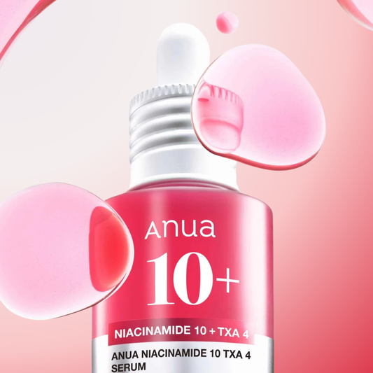 Close-up of Anua Niacinamide 10% + TXA 4% Serum – pink brightening serum with niacinamide and tranexamic acid.