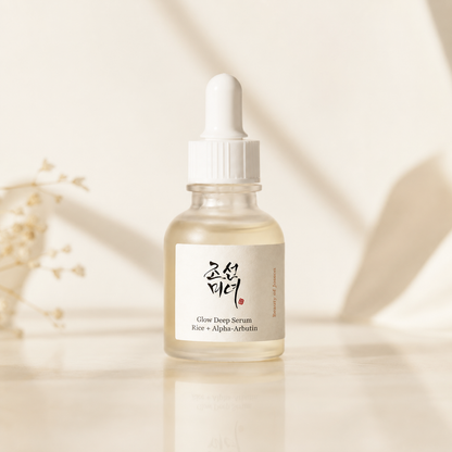 Beauty of Joseon Glow Deep Serum Rice + Alpha-Arbutin 30ml displayed in soft morning light with a minimal Gaia-style Korean skincare hero setup.