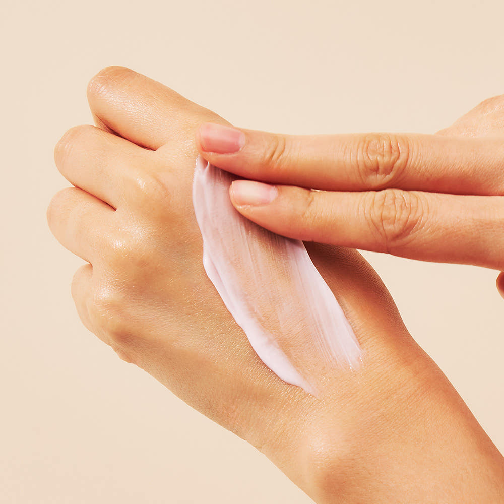 Applying Biodance collagen peptide cream texture on skin