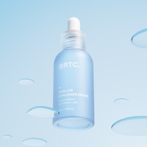 Applying BRTC Skin Lab Hyalinger Serum for plump hydrated skin