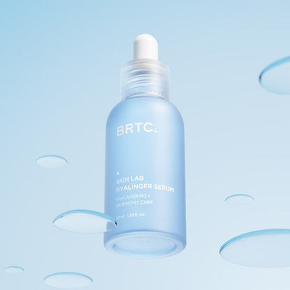 Applying BRTC Skin Lab Hyalinger Serum for plump hydrated skin