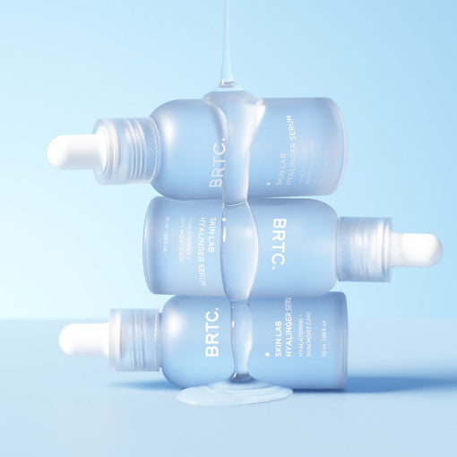 Applying BRTC Skin Lab Hyalinger Serum for plump hydrated skin