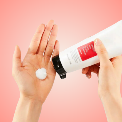 Applying COSRX Salicylic Acid Daily Gentle Cleanser foam on hand – gentle exfoliating cleanser
