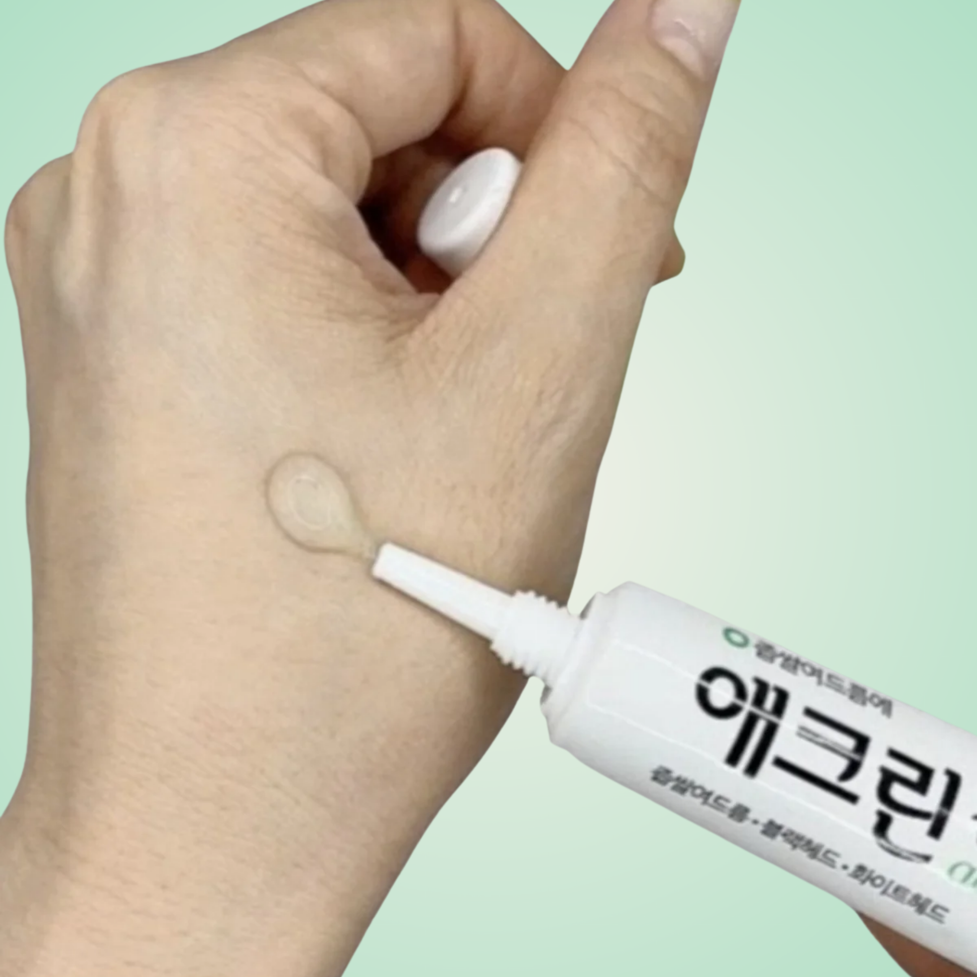Applying Aclean Gel on hand – calming and purifying spot treatment for acne-prone skin