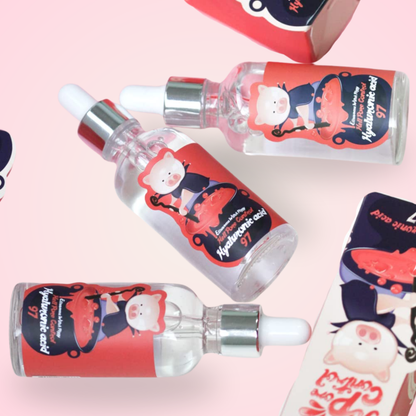 Flat lay of Elizavecca Witch Piggy Hyaluronic Acid 97% – fun, hydrating serum for dewy skin.