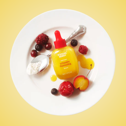 EQQUALBERRY Vitamin Illuminating Serum with berries and fruit flatlay