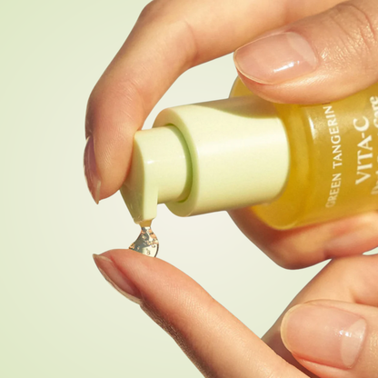 Applying Goodal Green Tangerine Vita C Serum – fresh vitamin C boost for clear, luminous skin