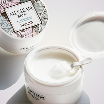 Open jar of Heimish All Clean Balm – gentle solid balm that transforms into oil for deep cleansing