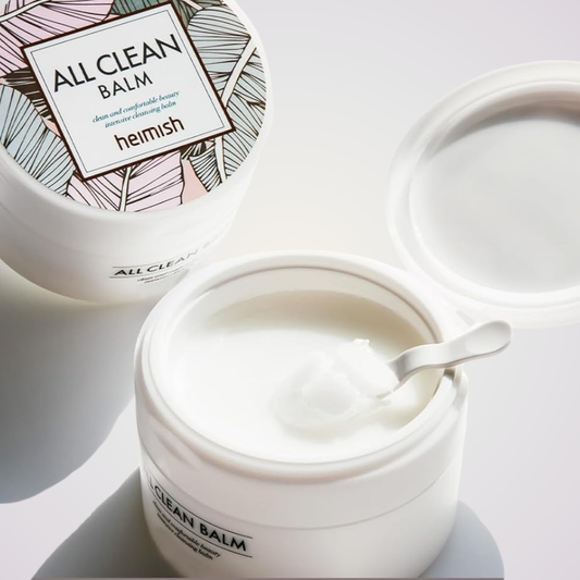 Open jar of Heimish All Clean Balm – gentle solid balm that transforms into oil for deep cleansing