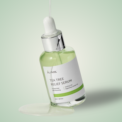 iUNIK Tea Tree Relief Serum with dropper dispensing clear texture