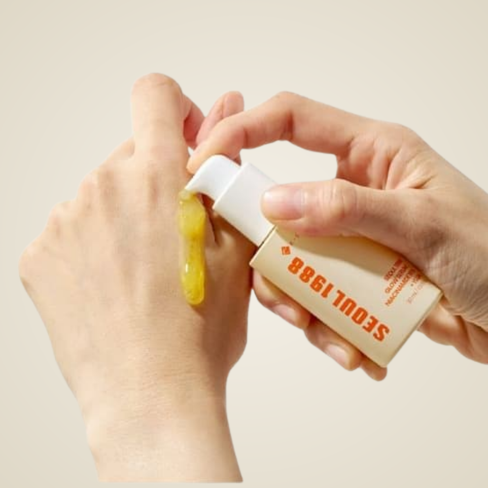 Applying KSECRET SEOUL 1988 Glow Serum on skin – lightweight texture that absorbs for luminous finish