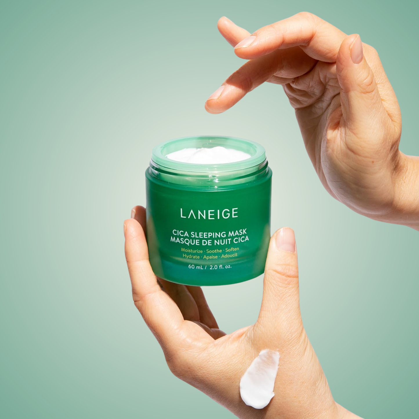 Applying Laneige Cica Sleeping Mask with hand and spatula