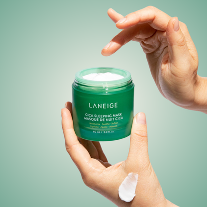 Applying Laneige Cica Sleeping Mask with hand and spatula