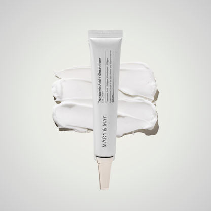Mary & May Tranexamic Acid + Glutathione Eye Cream – brightening formula displayed on creamy texture background
