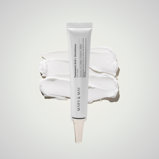 Mary & May Tranexamic Acid + Glutathione Eye Cream – brightening formula displayed on creamy texture background