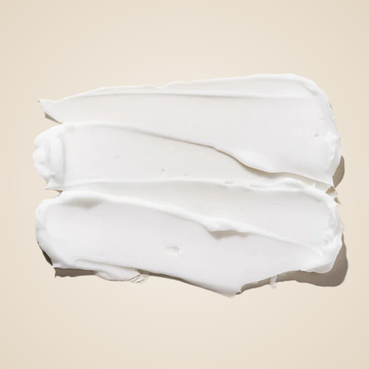 Close-up of Mary & May Tranexamic Acid + Glutathione Eye Cream texture – rich, smooth white cream