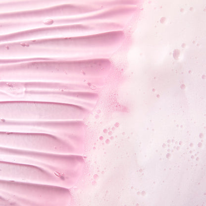 MARY & MAY Vegan Low pH Hyaluronic Gel Cleanser 150ml — close-up of pink cleanser lather.