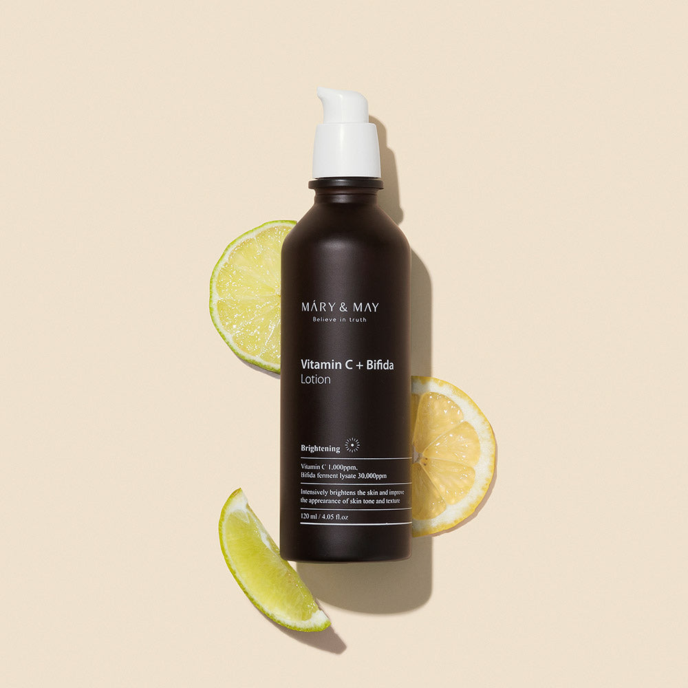 MARY & MAY Vitamin C+Bifida Lotion 120ml — lotion bottle and citrus slices.