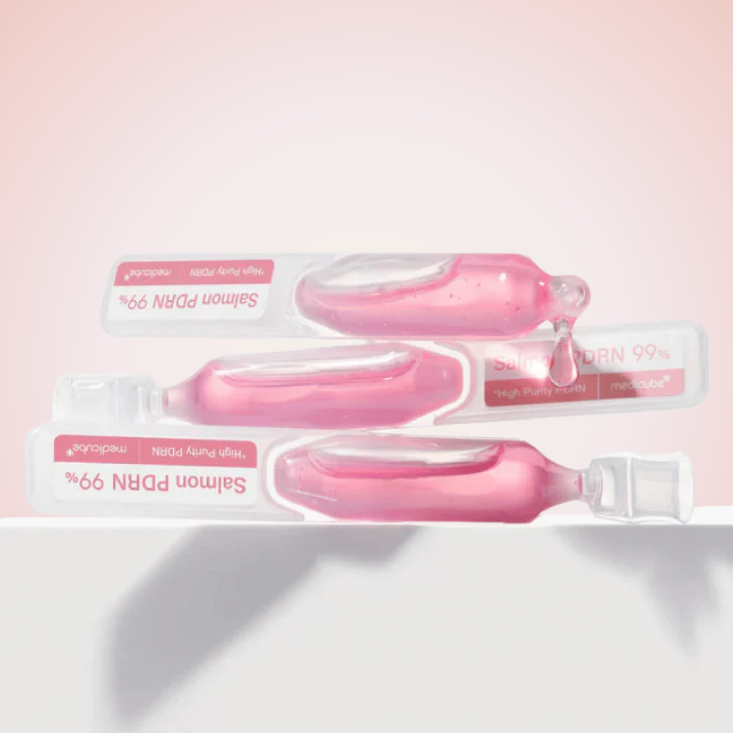 Flatlay of Medicube PDRN Pink One Day Serum 10EA with opened vials – daily Korean skincare treatment for elasticity