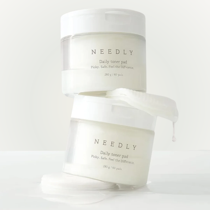 Stacked jars of Needly Daily Toner Pad – minimalist skincare for balanced, smooth complexion